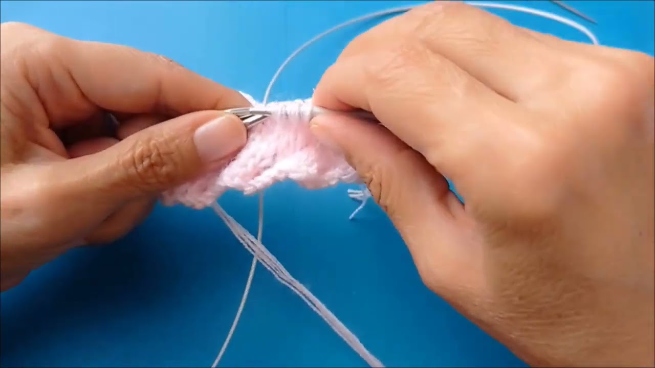 hilos y agujas entrelazados